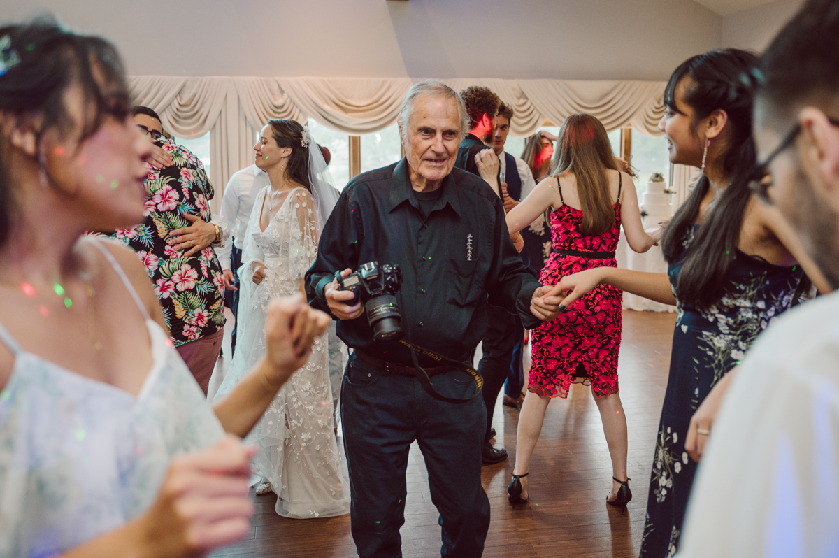 These two dancers, passionate lovers got married on a hot humid day at Auletto Caterers in Deptford NJ. Even though it was hot & humid Nina and Hector were all smiles as well as their family during the family portrait time. Wedding couple's and families that listens to you and does everything you ask them to even though the weather and environment can be tough are the BEST kind of clients! Nina and Hector were that best ideal clients, they from day one left all control regarding photo to me, did not question or have concerns. Knowing that you have this full trust and control on the wedding day makes you want to give your 100% and more. Nina and Hector are one of my top ideal clients and their wedding day photos are living proof of it. Nina and Hector's wedding day was combined of casual, mess, chaos, laughters, chill, emotional and passionate love for dancing. This was my first time at Auletto Caterers and in this part of NJ and this wedding venue in Deptford NJ was a pleasant surprise. It was full of secret locations for photos, garden, little pond where I played around with reflections, peacocks, waterfall and lavender field! Plus kind people to work with. Nina and Hector's July wedding at Auletto Caterers NJ captured by Karis from Hey Karis NY, NJ, Brooklyn, Hudson Valley and Catskills Wedding and Elopement Photographer.